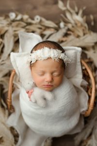 During A Newborn Photoshoot Dallas Newborn Photographer