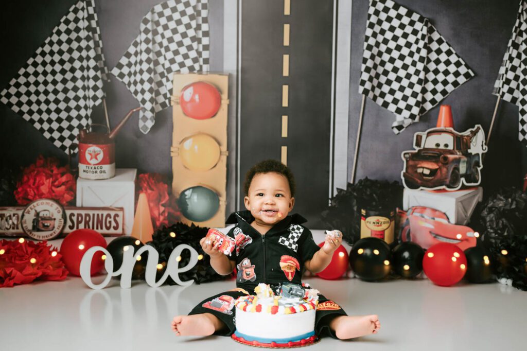 6 Dos And Don'Ts For A Successful Cake Smash Photo Session 11 Cars Cake Smash Photography Dallas Inspired By Race Car Birthday Themes With Custom Backdrop And Birthday Cake.