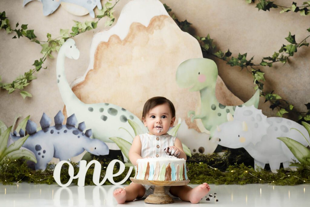 6 Dos And Don'Ts For A Successful Cake Smash Photo Session 13 Dinosaur First Birthday Cake Smash Featuring Prehistoric-Themed Décor And Custom Birthday Cake Photography.