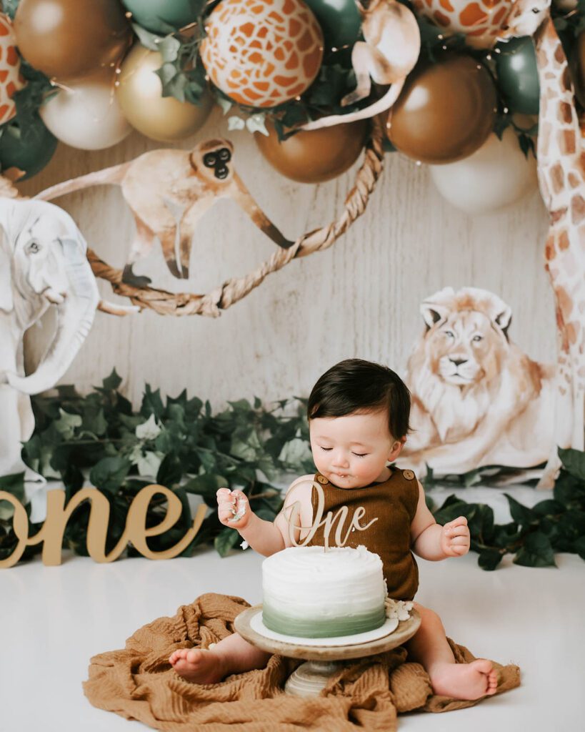 Cake Smash Safety: How To Prepare For Your Baby'S First Birthday 9 Baby-Friendly Cake Smash Theme Featuring A Safari-Inspired First Birthday Setup In A Dallas Cake Smash Photography Studio.