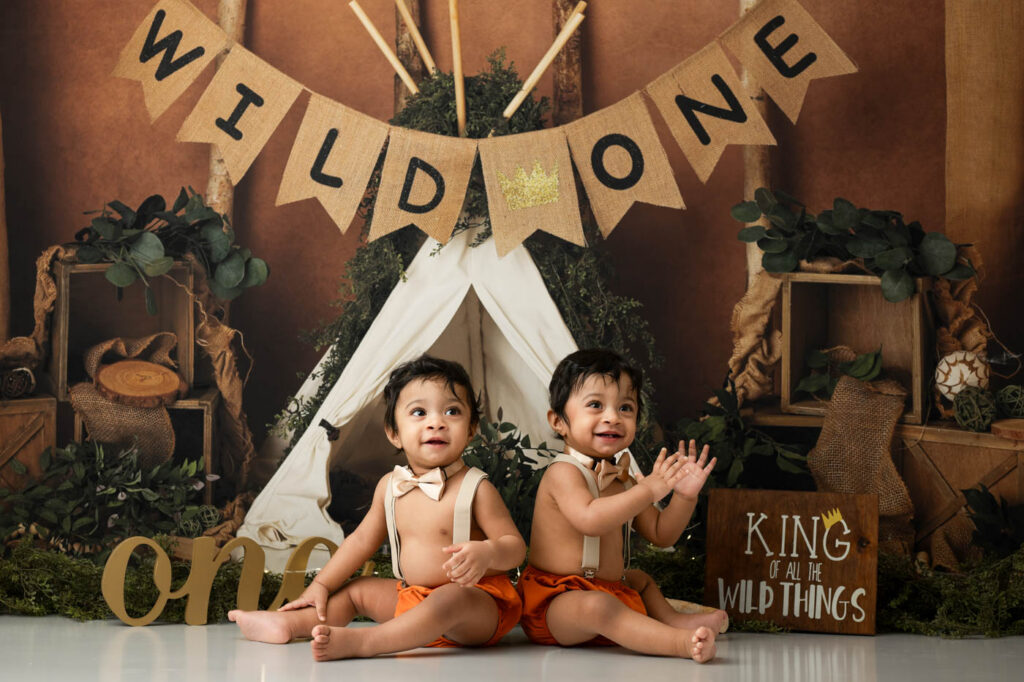 Cake Smash Photoshoot Tips For Including Siblings 8 Brother And Sister Posing Together During A First Birthday Cake Smash Photography Session In Dallas