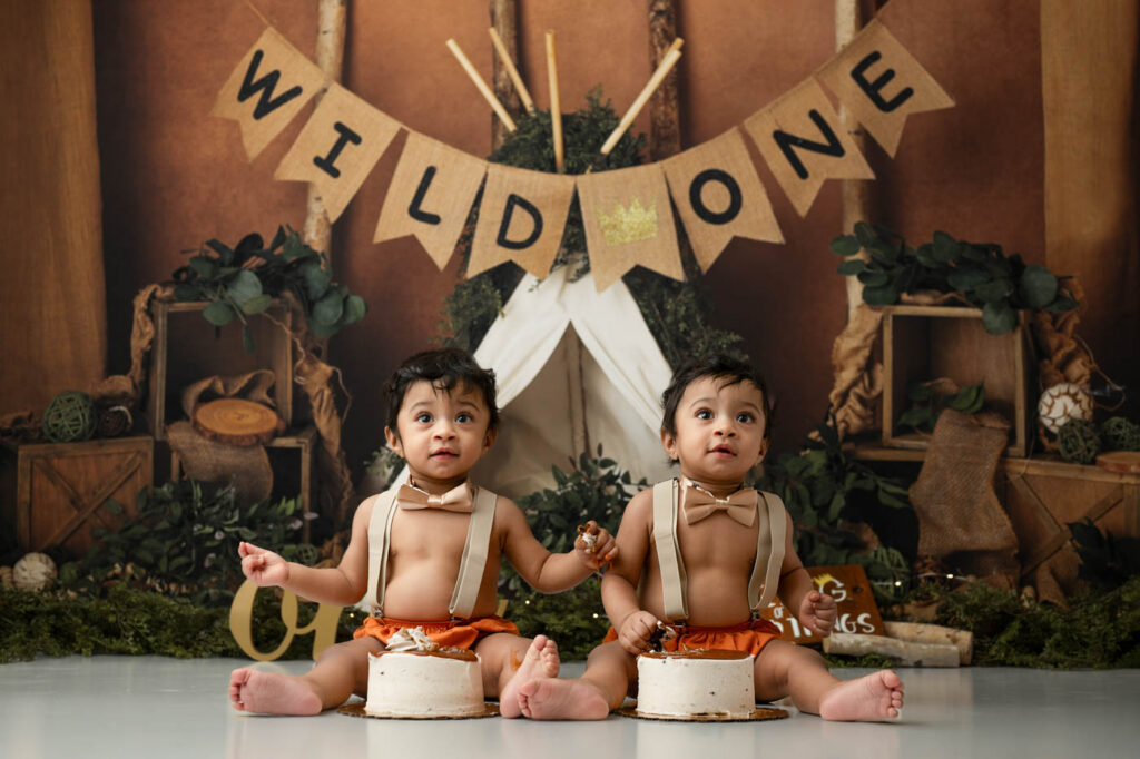 Cake Smash Photoshoot Tips For Including Siblings 9 Twins Enjoying A Wild One Themed First Birthday Cake Smash Session In Dallas