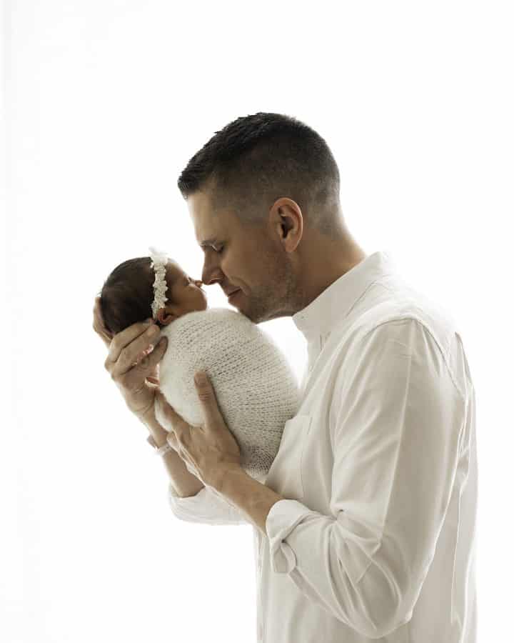 Father Gently Touching Newborn Nose For Newborn Baby Photographer In Dallas | Lily Hayes Photography