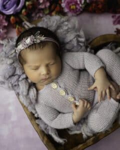 Baby Dressed In A Floral Headband, Sleeps On A Textured Blanket Perfect For Photography For Newborns With Newborn Photographer Lily Hayes Photography