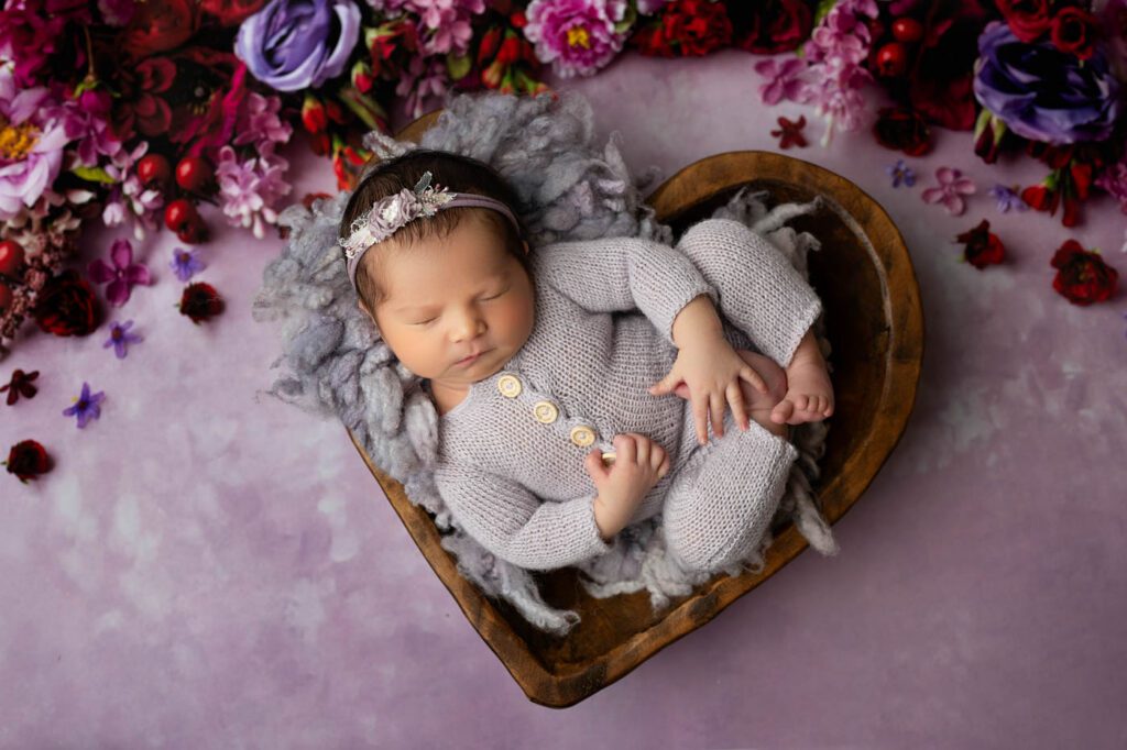 Dallas Newborn Photographer | Baby Chloe'S Newborn Session 11 Baby Girl Posed In A Heart-Shaped Prop During A Dallas Newborn Photography Session