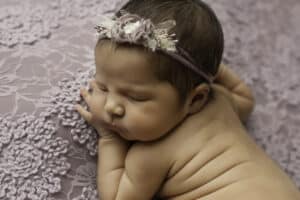 Newborn Sleeping On A Purple Lace Blanket Captured Beautifully By A Professional Dallas Newborn Photographer | Lily Hayes Photography