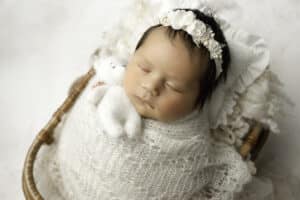 Newborn Sleeping Holding White Teddy Bear Captured By Dallas Baby Photographer | Lily Hayes