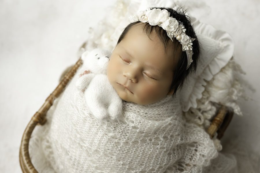 Newborn Sleeping Holding White Teddy Bear Captured By Dallas Baby Photographer