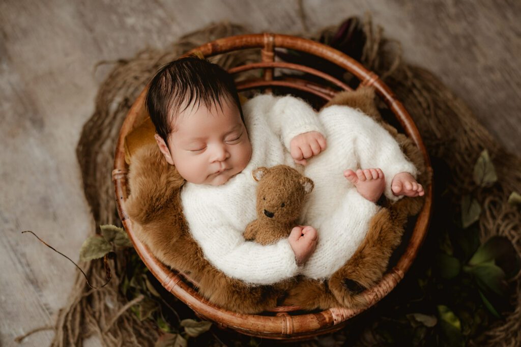 Baby Photography Props For Timeless Newborn Portraits 14 Newborn Baby In Basket With Soft Textures And Natural Editing Style In Dallas Newborn Photography Studio