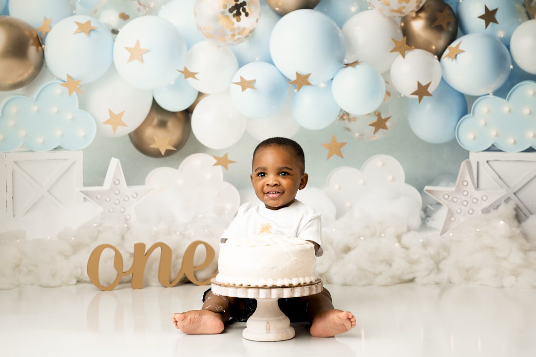 Baby Eating Cake For A Cake Smash Photoshoot Dallas