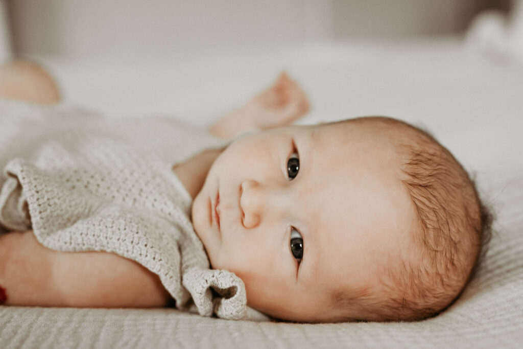 Closeup Newborn Portrait During Lifestyle Newborn Photography Session In Dallas