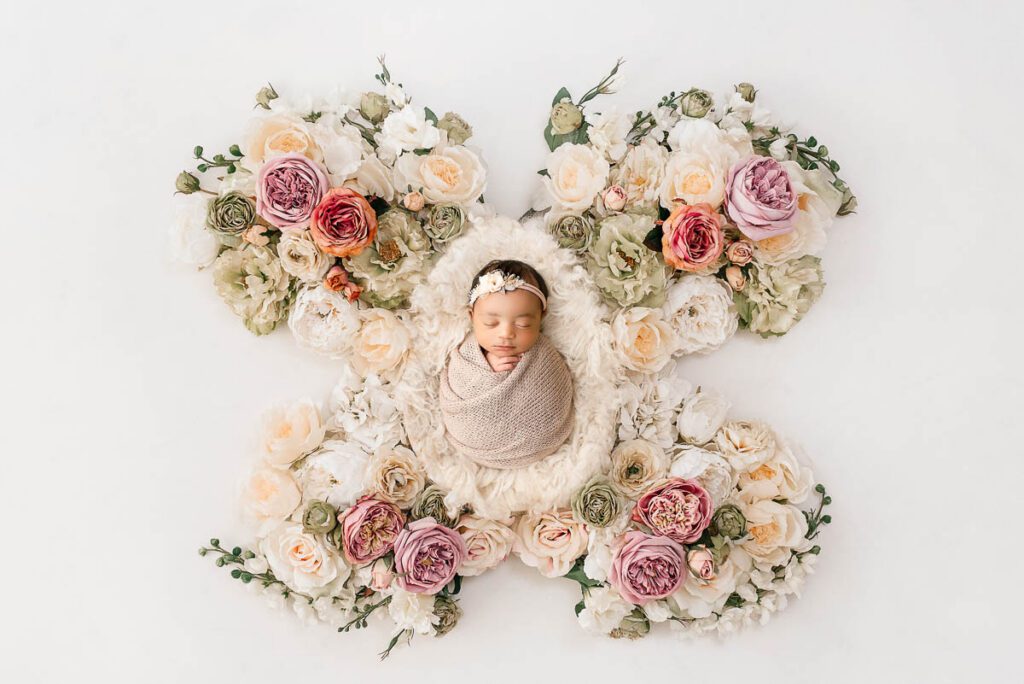 Mini Vs Full Newborn Sessions: What’s The Difference &Amp; Which Is Right For You? 8 Newborn Baby Posed With Symmetrical Floral Arrangement Dallas Photographer