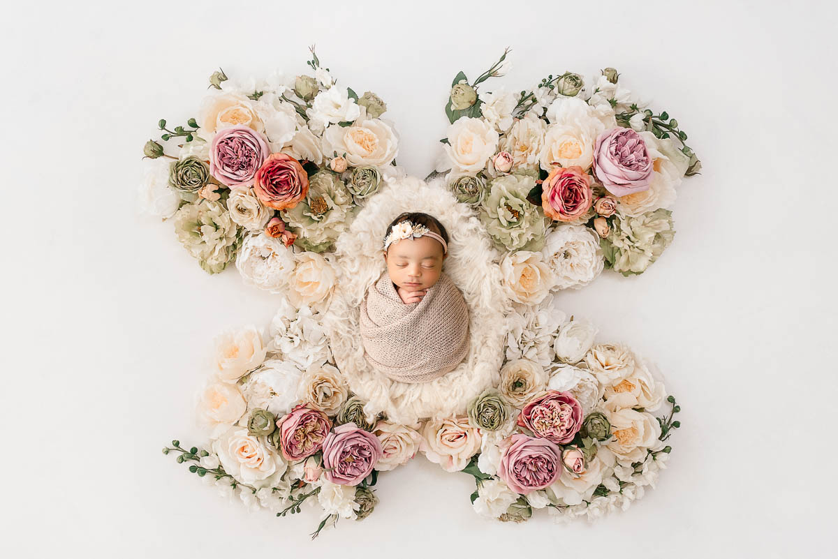 Newborn Baby Posed With Symmetrical Floral Arrangement Dallas Photographer