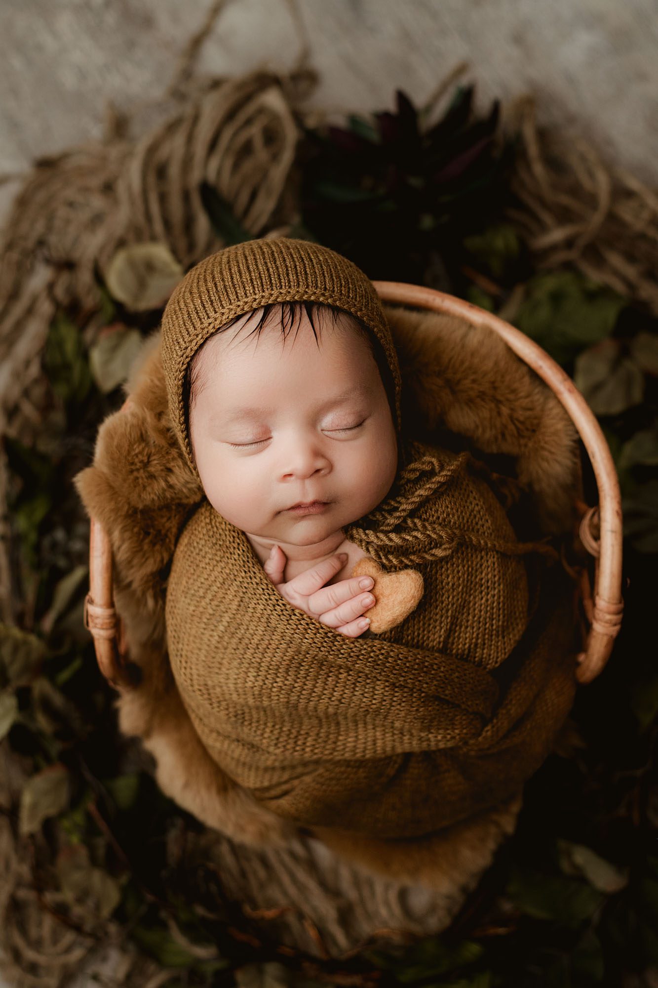 Swaddled Newborn In Earthy Tones With Bonnet And Heart Prop – Professional Dallas Newborn Photographer