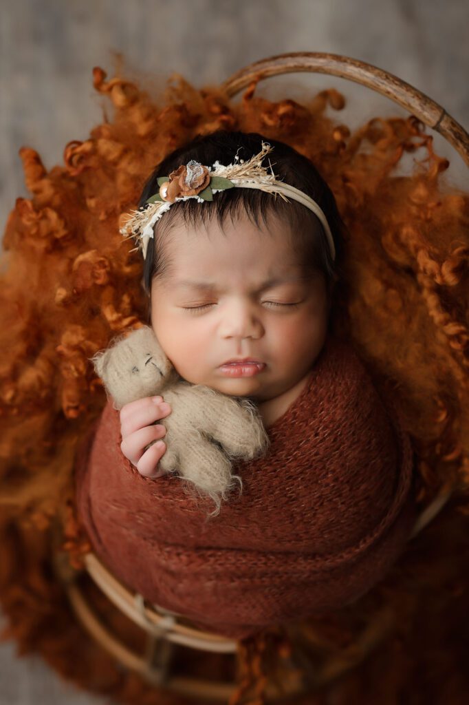 When Should You Book Baby Photos After A Newborn Session? 5 Sleeping Newborn Session Of Baby Girl Holding Small Teddy Bear – Dallas Newborn Photography Session In Dallas Tx