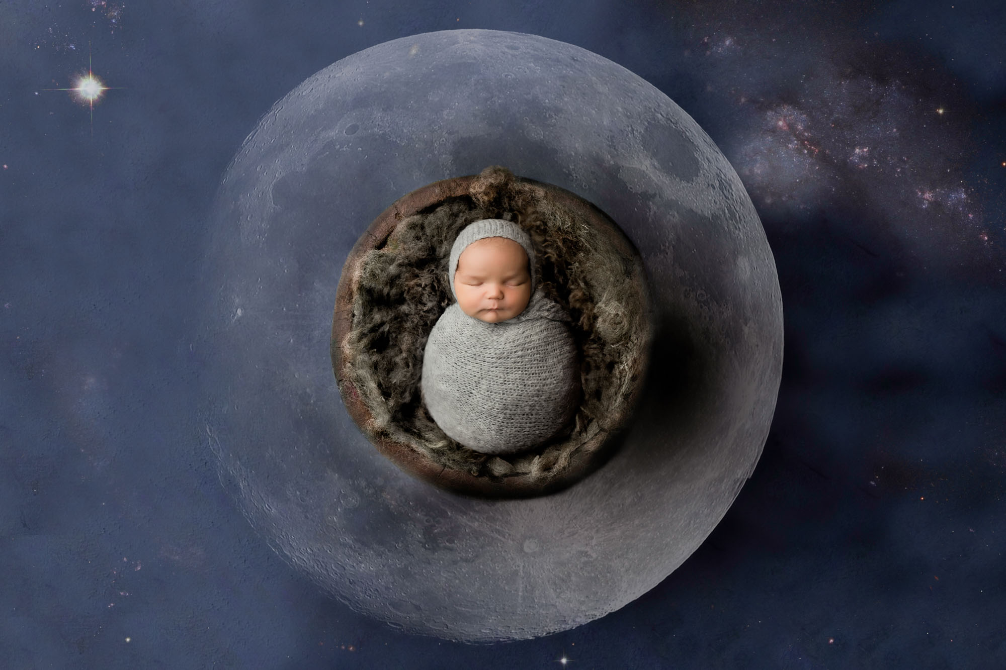 Embrace Newborn Photography: The Alluring Joy Of Digitals 1 Newborn Baby Wrapped In Gray Posed On Moon Prop With Galaxy Starry Night Background In Dallas Newborn Photography Studio