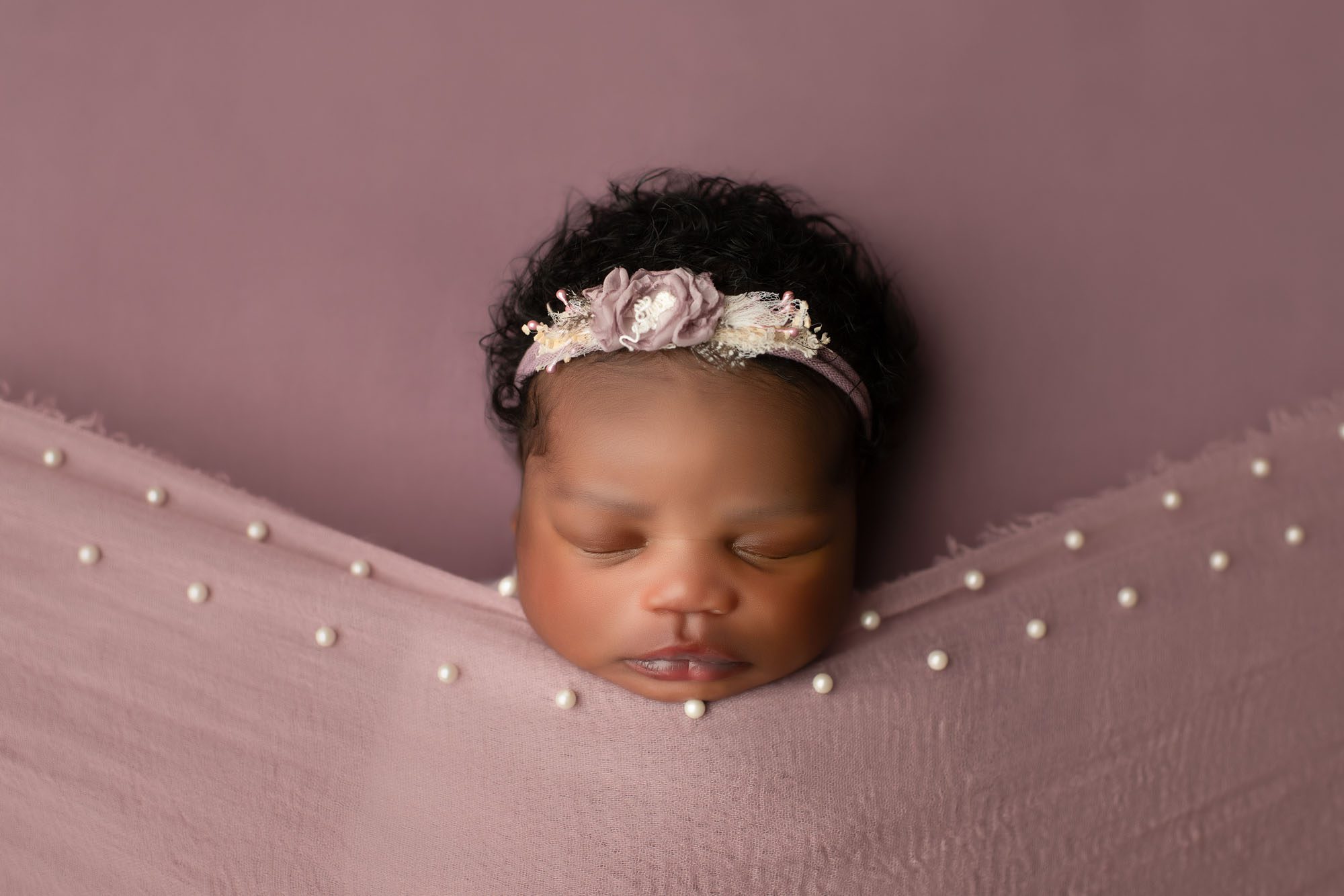 Newborn Sound Machine | Why Photographers Use Them 1 Close-Up Newborn Portrait With Headband – Dallas Infant Photographer