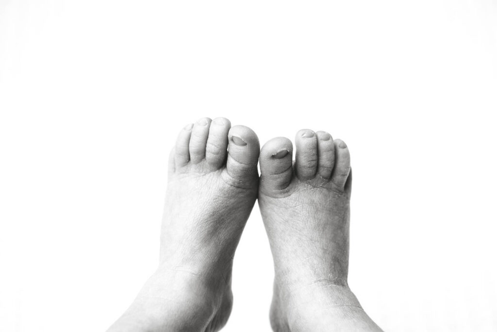 Close-Up Of Newborn Baby Toes Photographed During A Dallas Newborn Photography Session