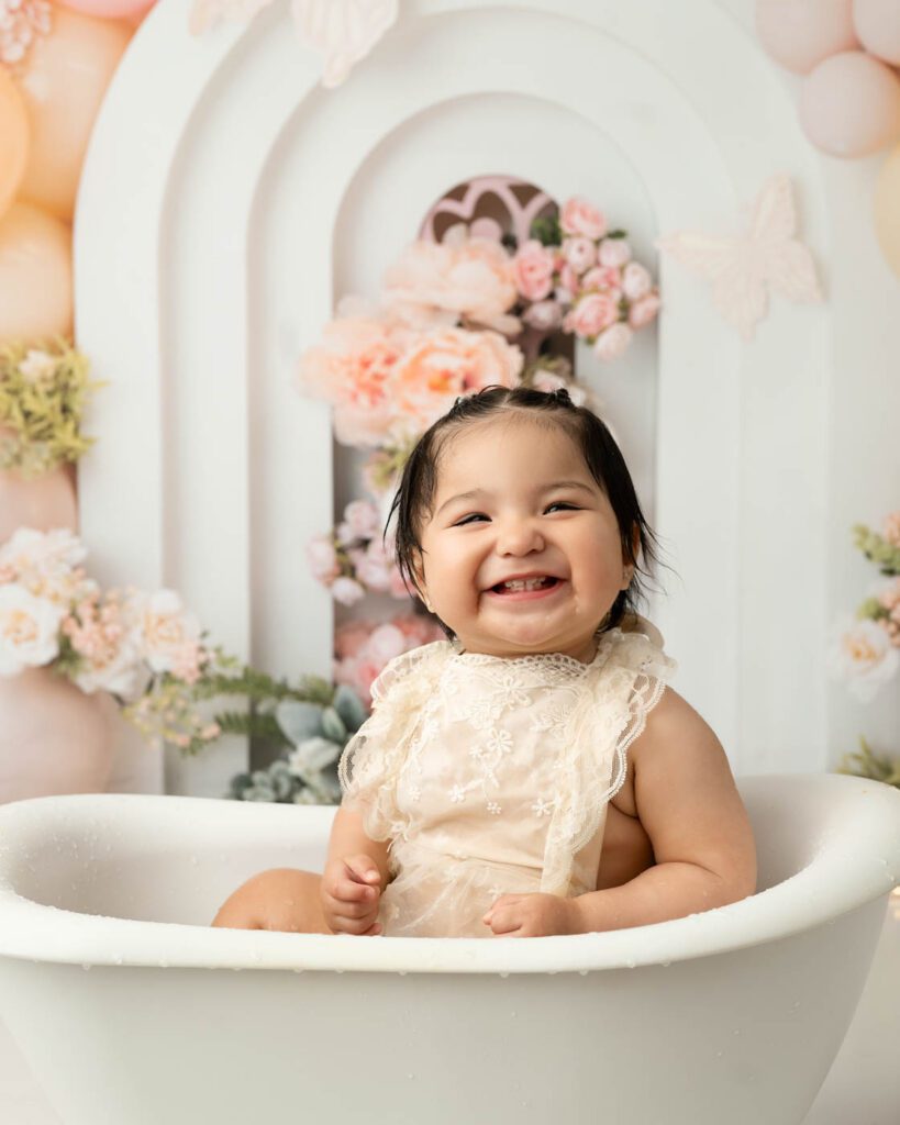 Close-Up Portrait Of Baby Girl During Milk Bath Photography Session In Dallas