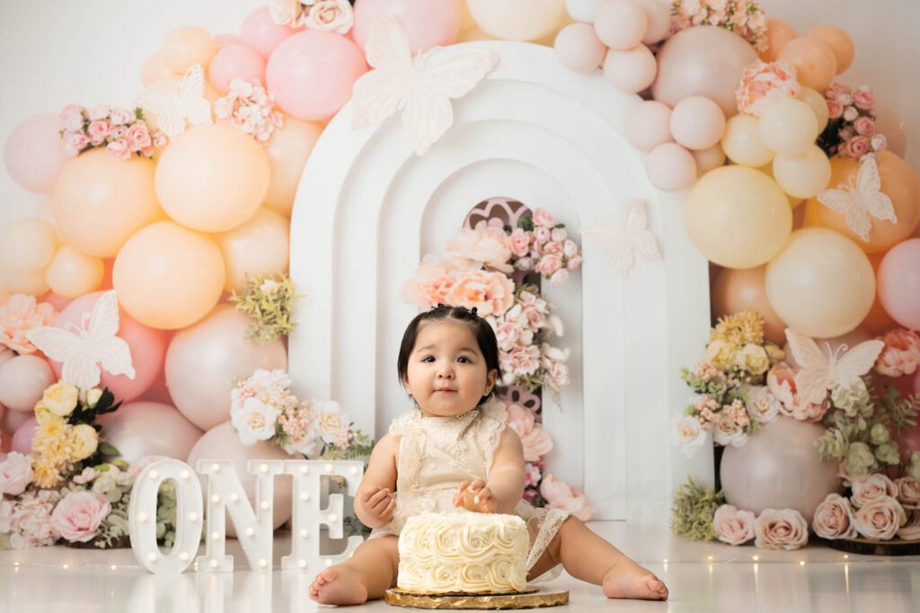 Pastel Butterfly Cake Smash Photography Setup With One Year Old Girl In Dallas