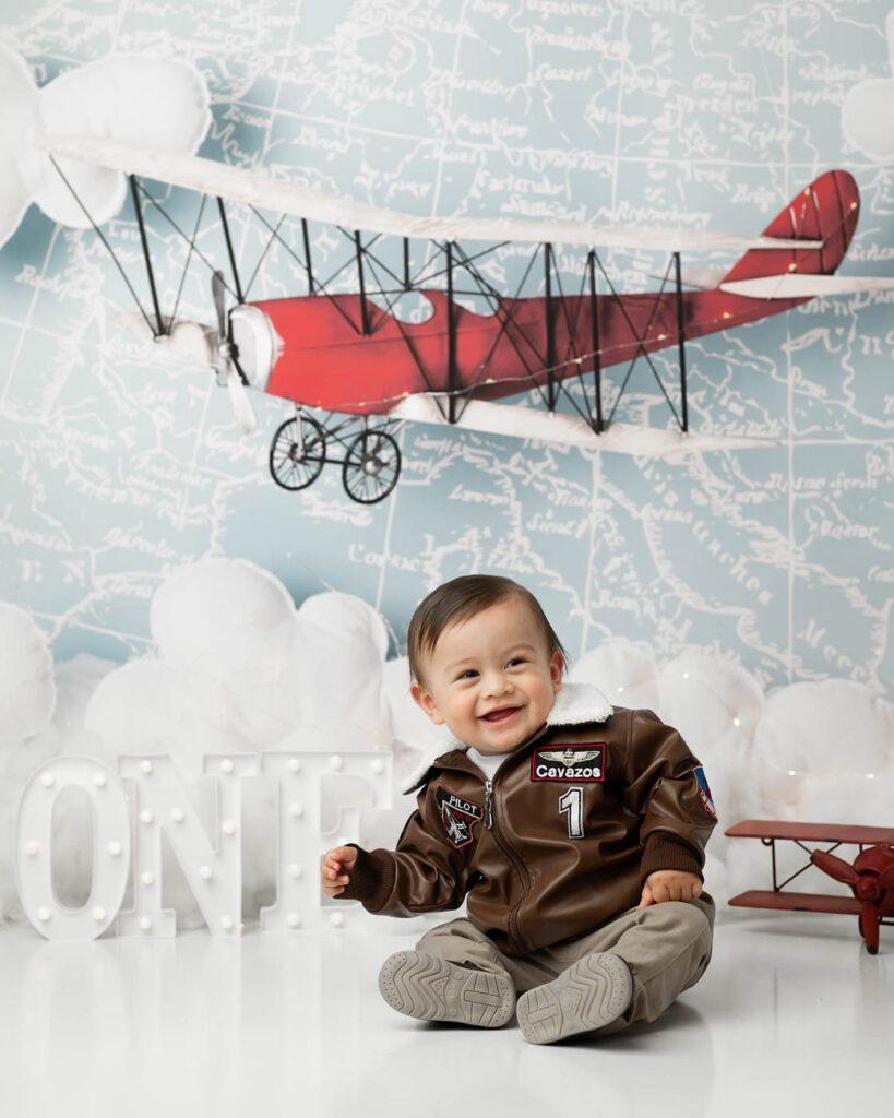 Happy Baby During A First Birthday Cake Smash Photography Session In Dallas