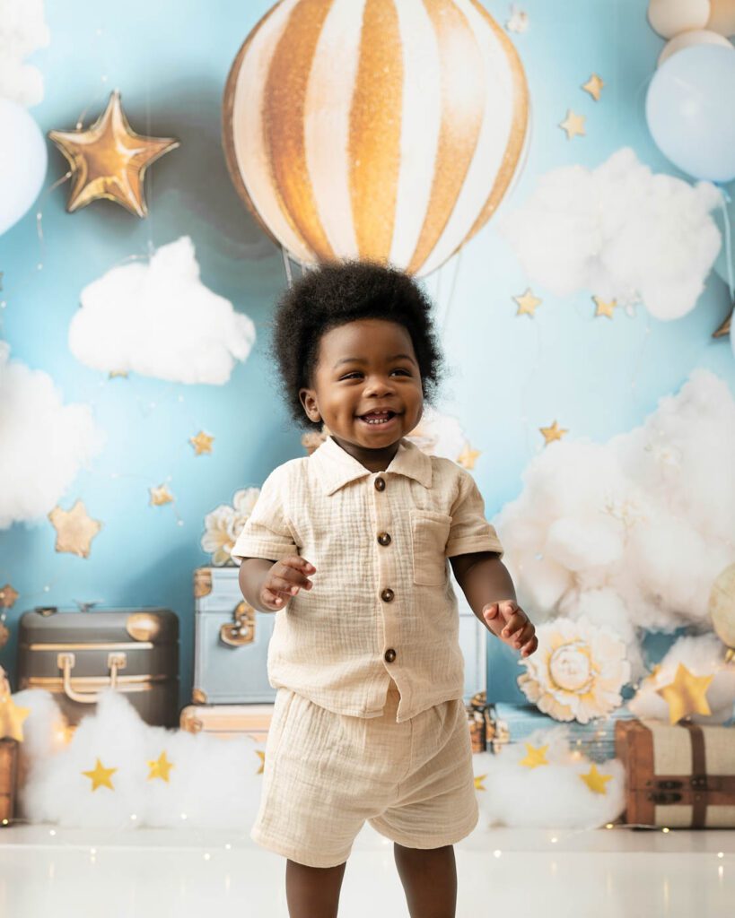 Standing Portrait Of A One-Year-Old During A Milestone Photography Session In Dallas.