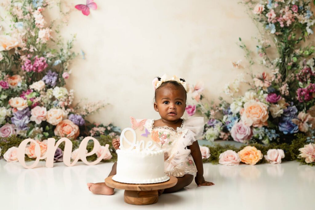 What If Your Baby Won’t Smash The Cake During A Cake Smash Session? 11 Baby Won'T Smash Cake During A Dallas Cake Smash Photography Session As She Carefully Studies Her First Birthday Cake Before Deciding Whether To Touch The Frosting.