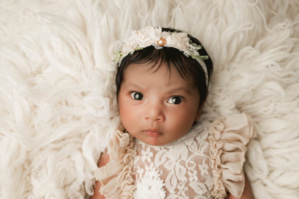 What Happens If My Baby Won’t Sleep During A Newborn Session? 14 Baby Girl Portrait With Bright Eyes During A Newborn Photography Session In Dallas